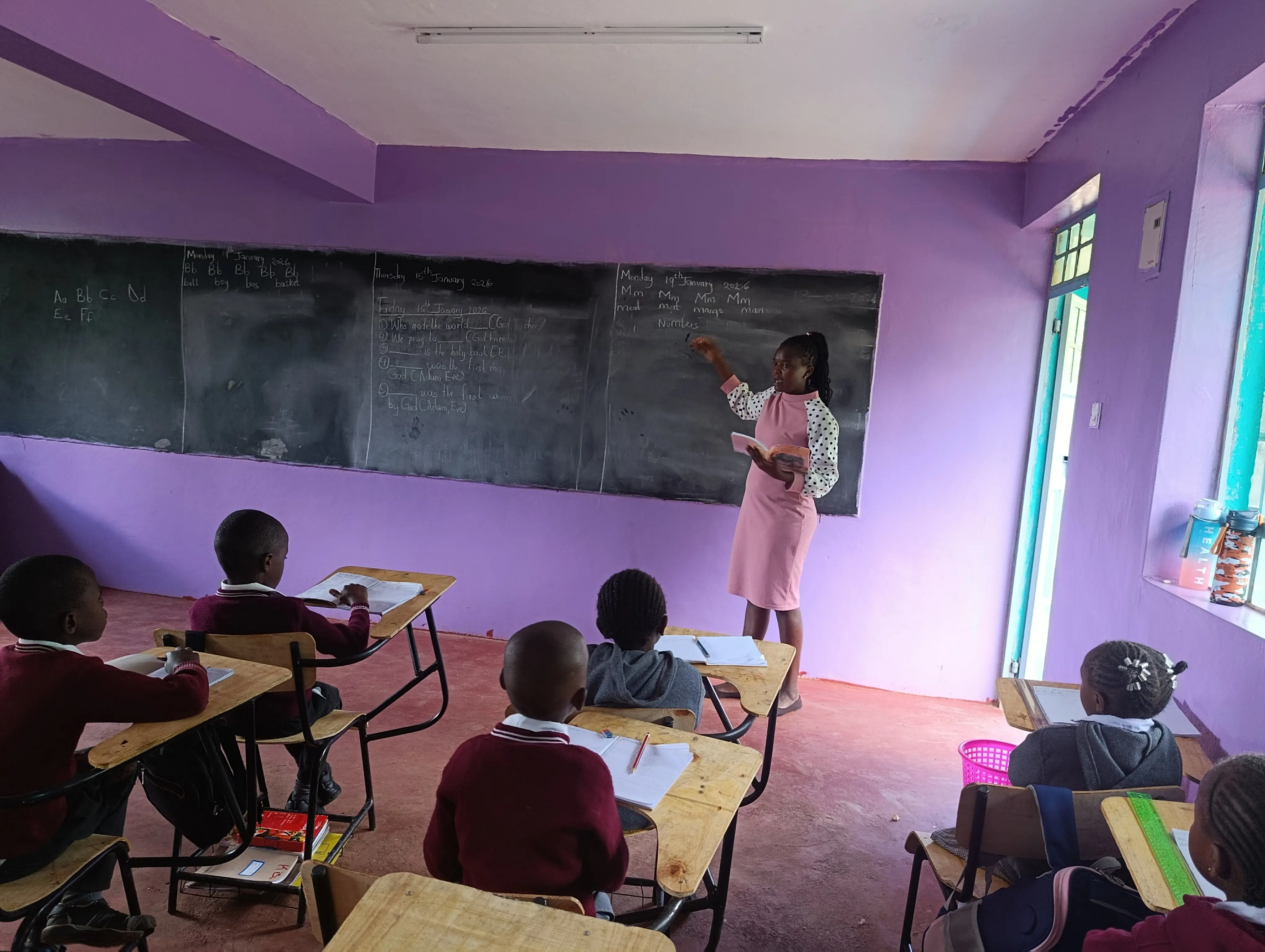 Group of school children in a photo wearing their uniforms